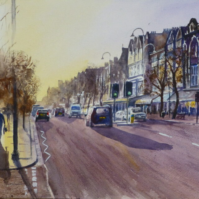 A watercolour painting of Southport's Lord Street with pedestrians and traffic as the sun sets behind the end of the street .