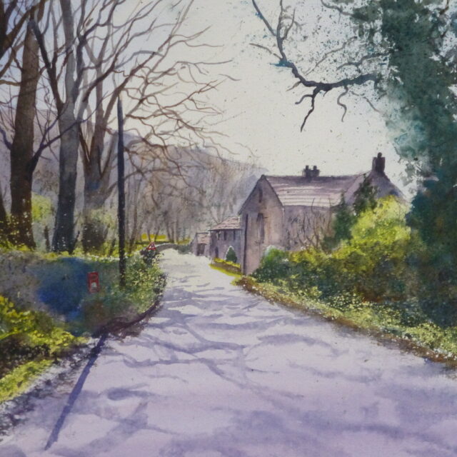 A watercolour painting of a country lane and cottages in Wharfedale on a spring morning with the sun highlighting the trees and daffodils