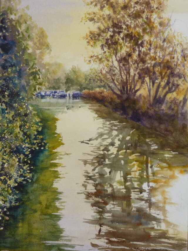 A watercolour painting of a stretch of the Leeds Liverpool canal near Scarisbrick with narrowboats and other craft in the distance and the sun coming up through the trees along the canal. Some ducks swim on the water.