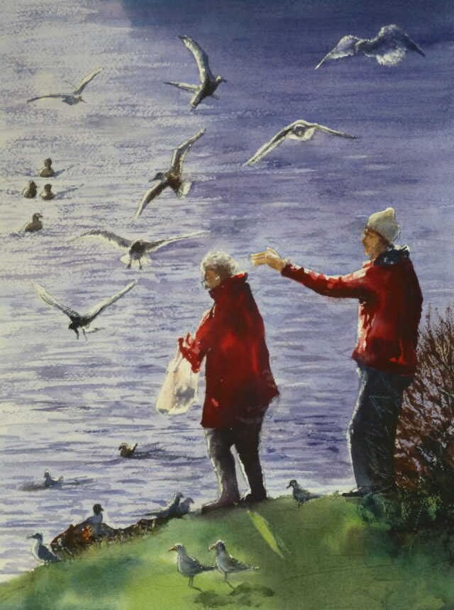 A water colour painting of a couple feeding the birds on the Lake at Southport. The light highlights the people and the feathers of the birds gathered for the feed and the plastic bag the woman holds