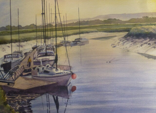 A watercolour painting of the boats moored at the Banks Boatyard on the River Douglas in the early morning with a view across the flat pastures beyond.