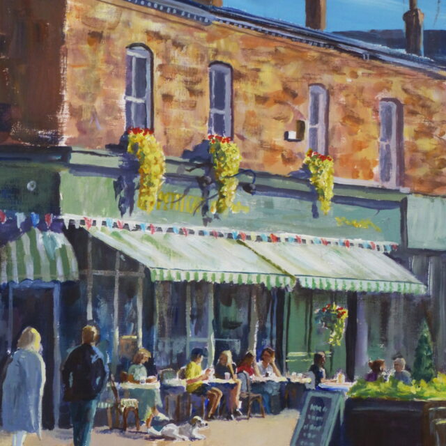 An acrylic painting of Lark Lane, Liverpool in the afternoon sunshine with drinkers, dogs and strollers enjoying the warm weather.
