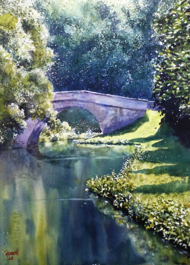 A watercolour apinting of a bridge over the canal as it disappears into a wooded area. Deep reflections are seen in the water.