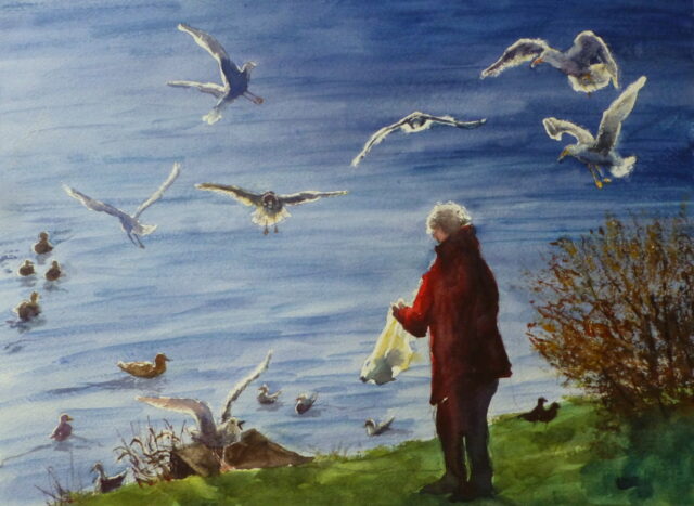 A water colour painting of a lady feeding the birds on the Lake at Southport. The light highlights the figure and the feathers of the birds