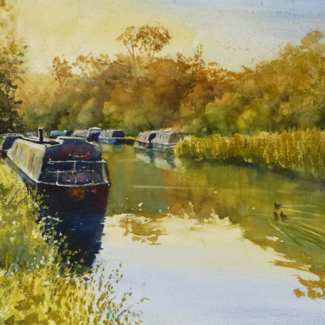 A watercolour painting of the Leeds/Liverpool Canal at Parbold with a narrowboat moored amongst the sunlit grasses of the bank.